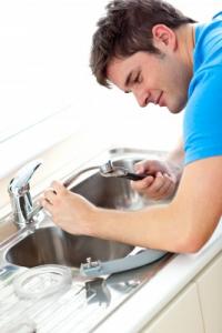 Plumbing in Lakewood Washington repairs a kitchen sink