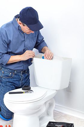 Matt is repairing a broken toilet